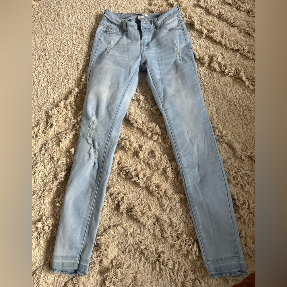 Forever 21 , light washed, distressed , stretchy jeans.